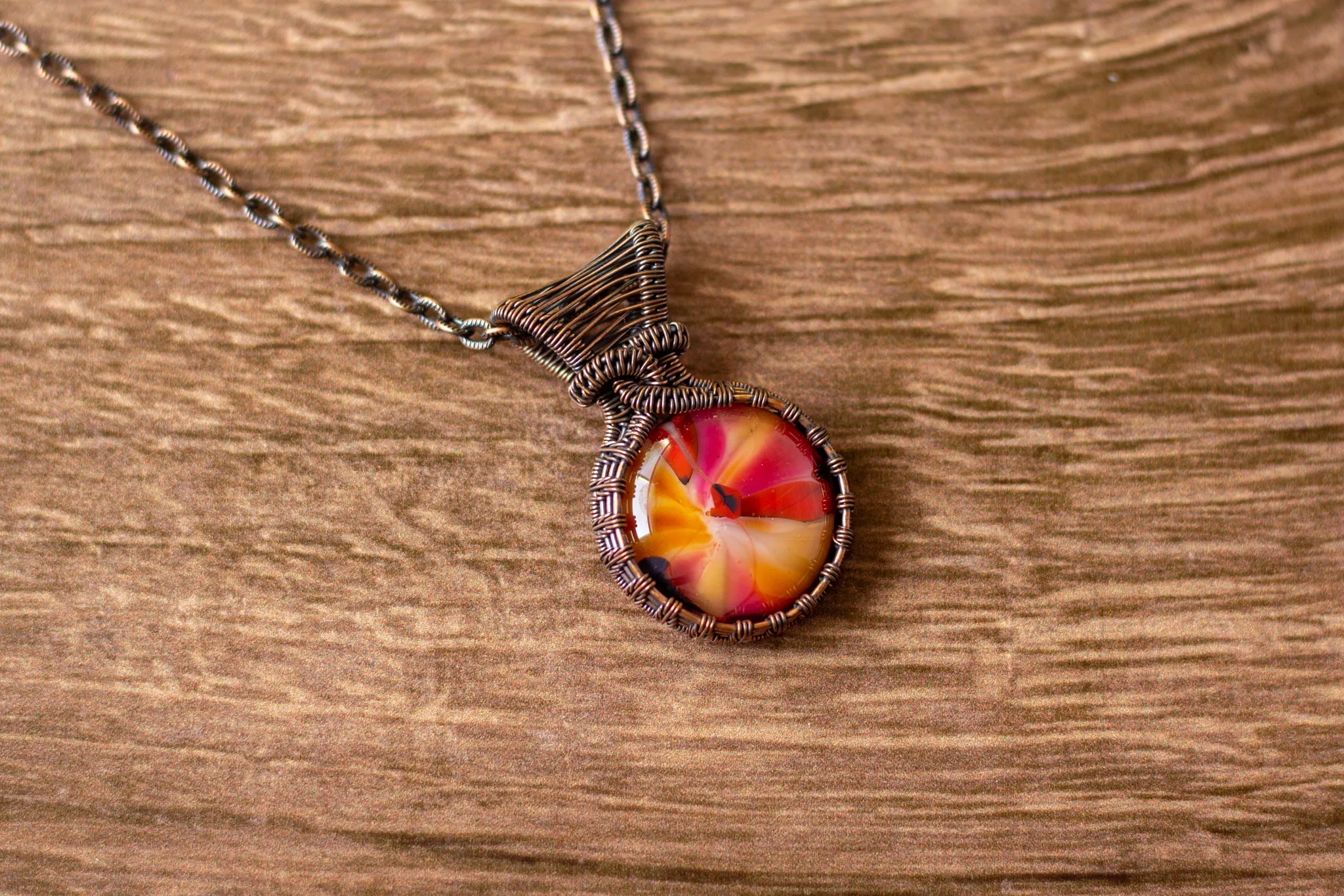Copper Wire Wrapped Pendant with Swirled Red and Orange Glass