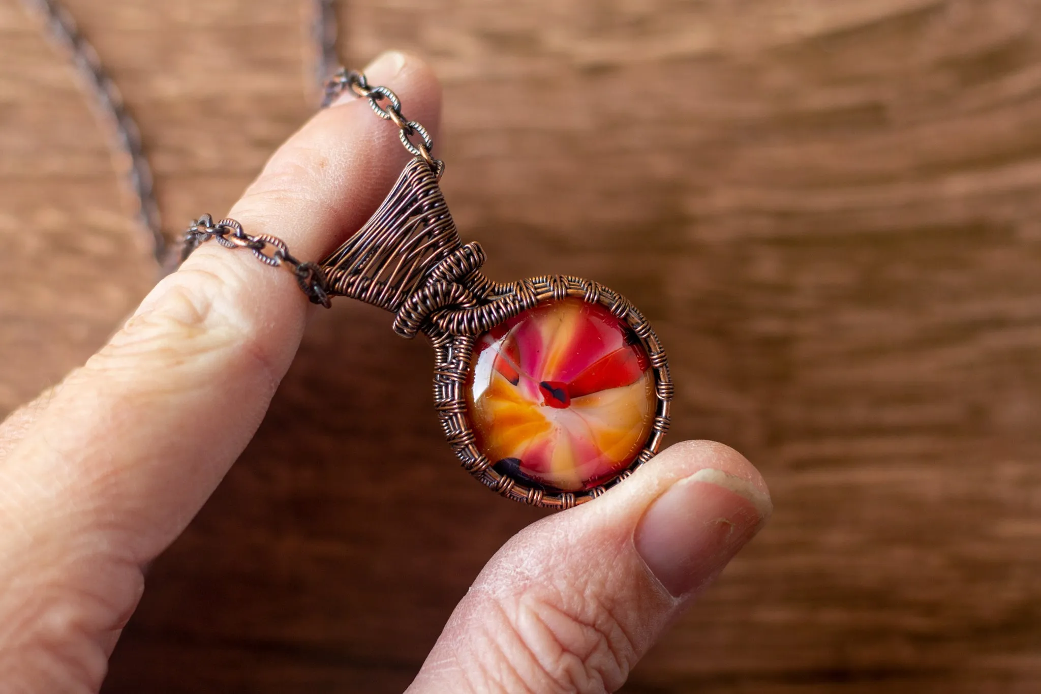 Copper Wire Wrapped Pendant with Swirled Red and Orange Glass