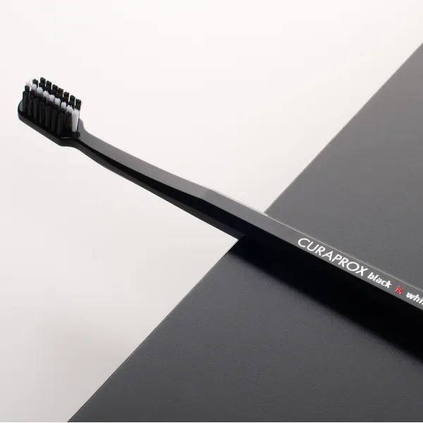 Curaprox Black is White