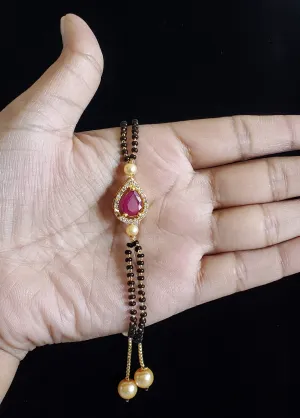 Pavani B and Hrushmitha Cz Hand Mangalsutra Bracelet With Gold Plating NV9