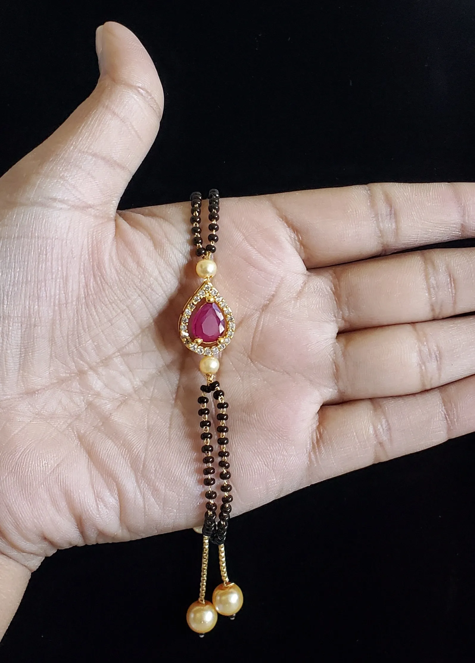 Pavani B and Hrushmitha Cz Hand Mangalsutra Bracelet With Gold Plating NV9