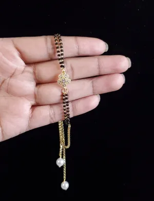 Revathi Kartheek Cz Hand Mangalsutra Bracelet With 2 Tone Plating GR60