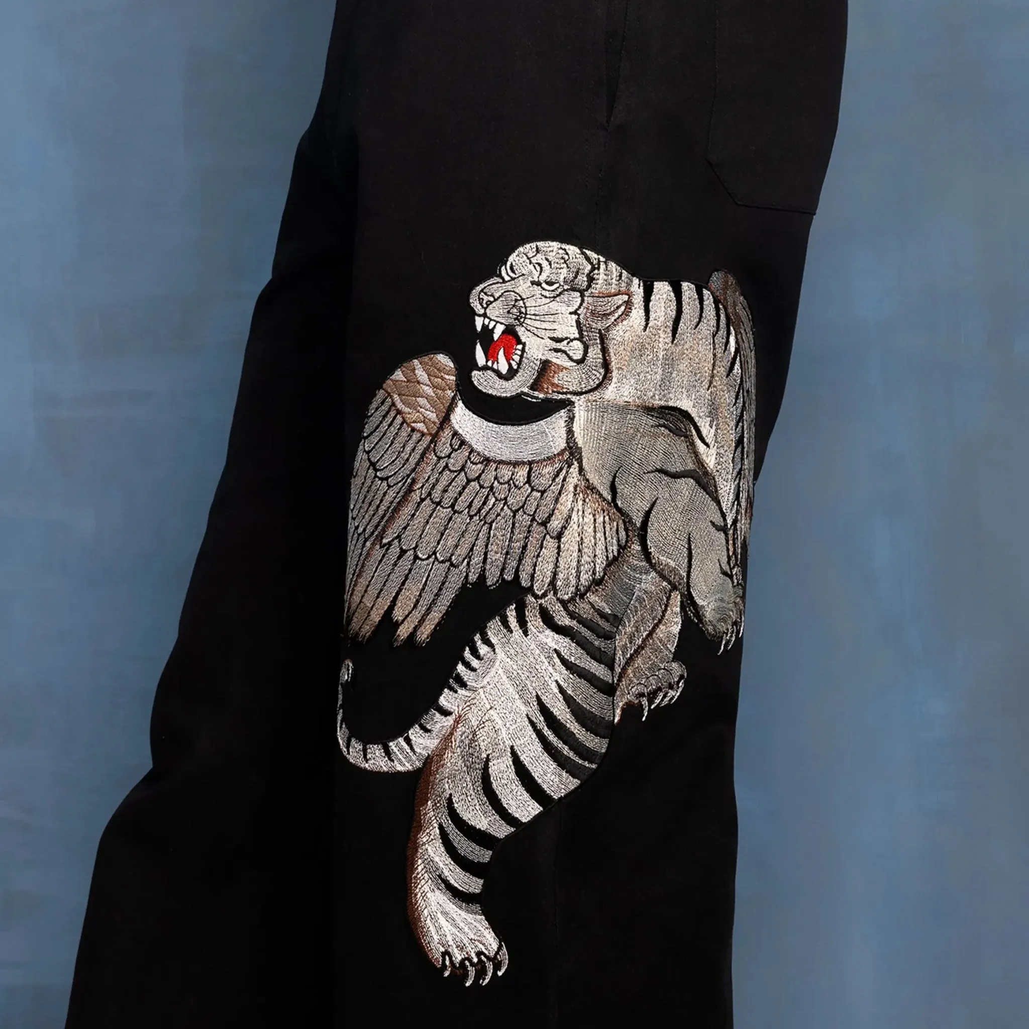 WINGED TIGER EMBROIDERED PANTS